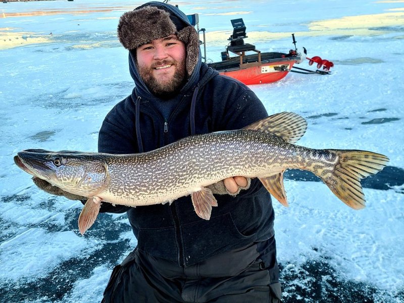 Experience the Thrill of Ice Fishing in Canada's Frozen Tundra in Canada